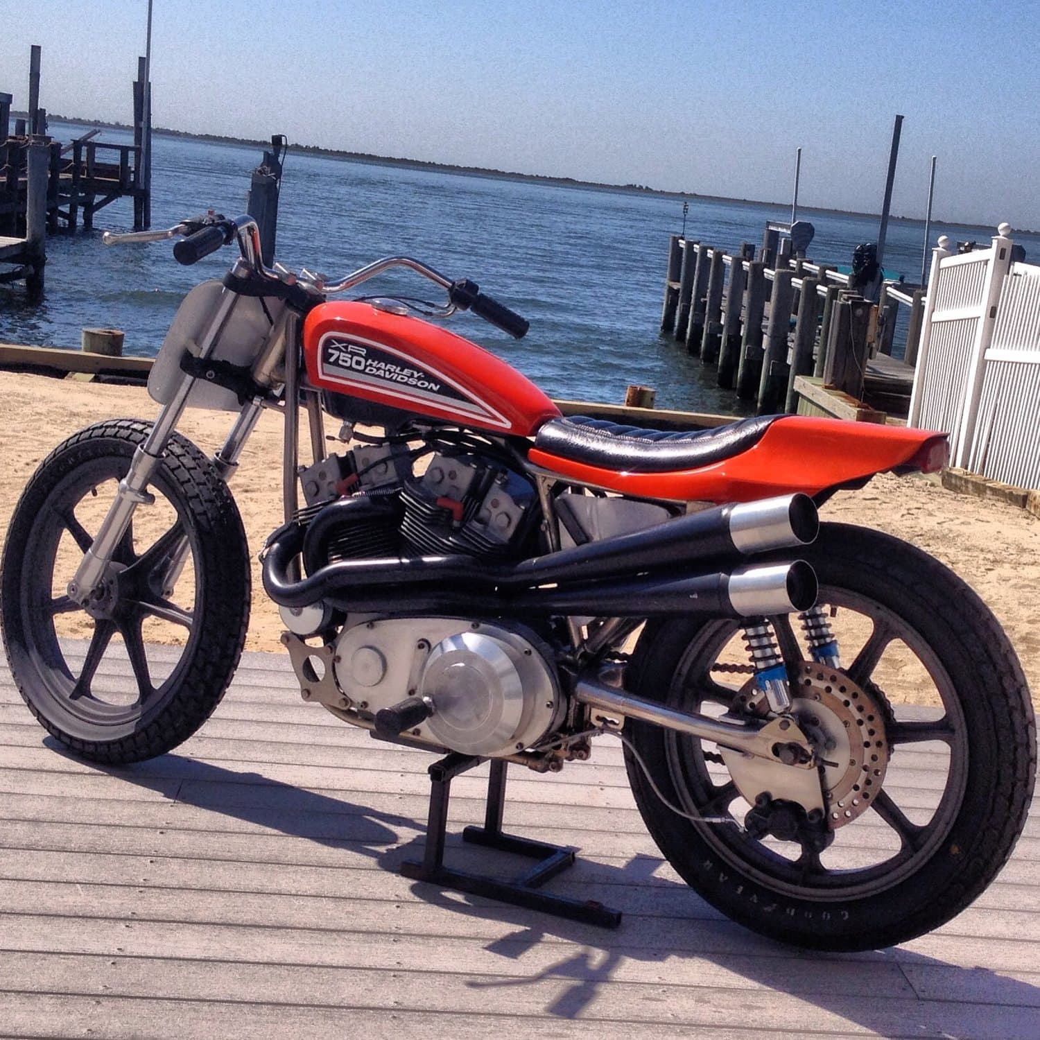 An image of an orange coloured 1975 Harley Davidson XR750