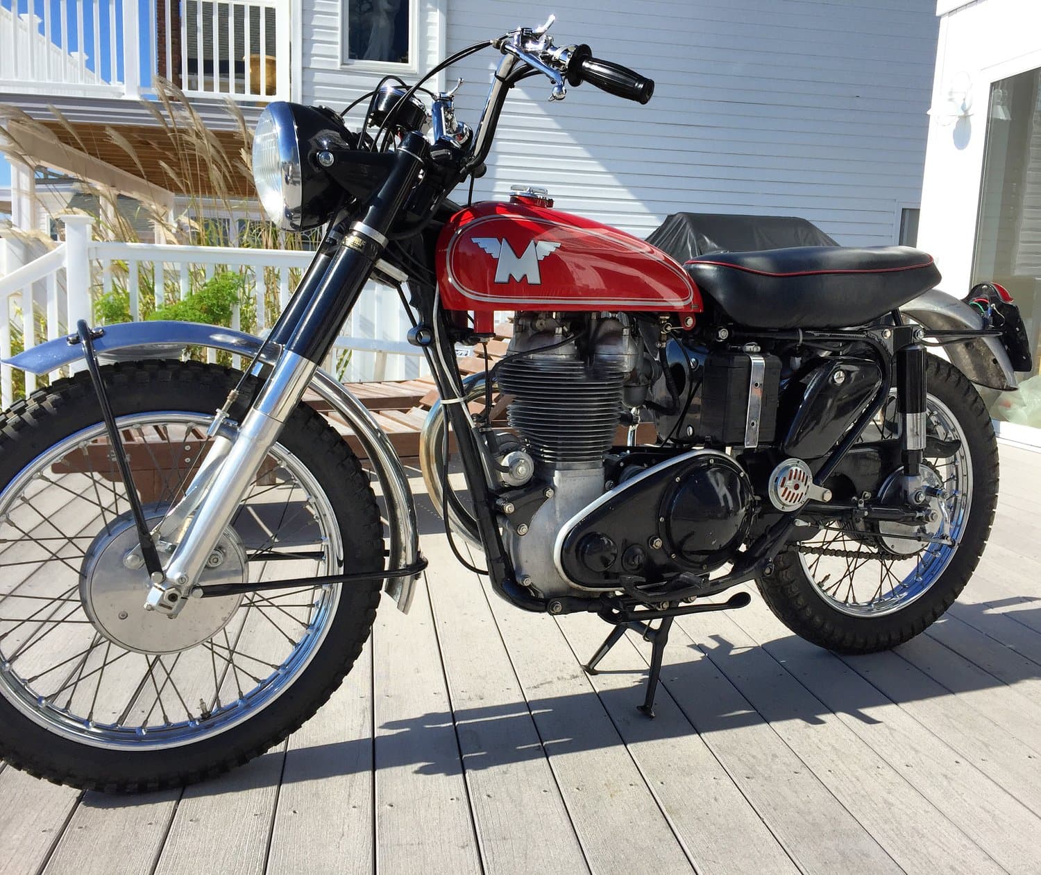 An image of a red 1959 Matchless G80