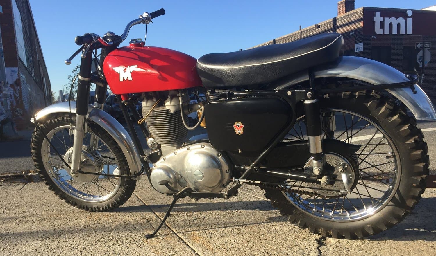 An image of a red 1961 Matchless G80 Scrambler