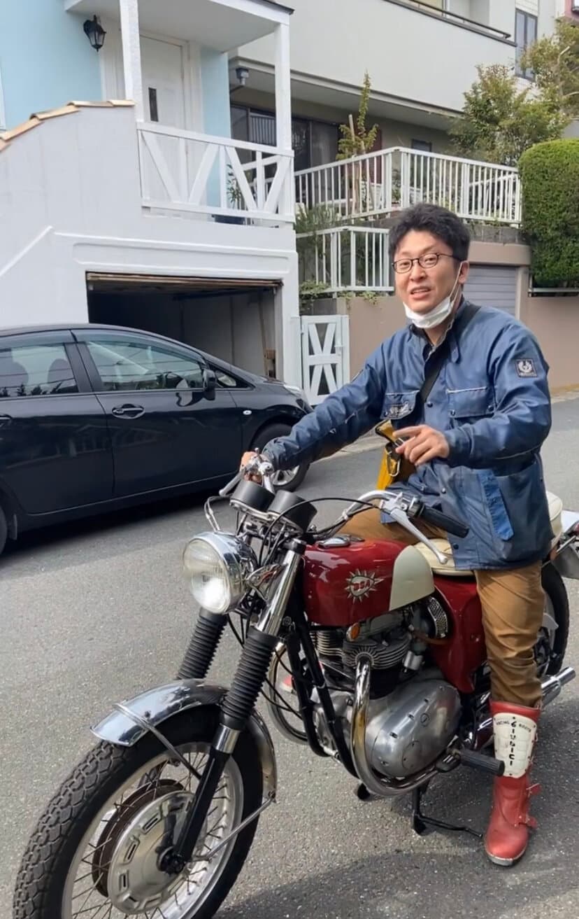 A satisfied customer riding his new motorbike away from New York City Motorcycles HQ in Zushi, Kanagawa, Japan.